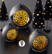 Decorative Halloween ornaments with spider web designs on a dark background