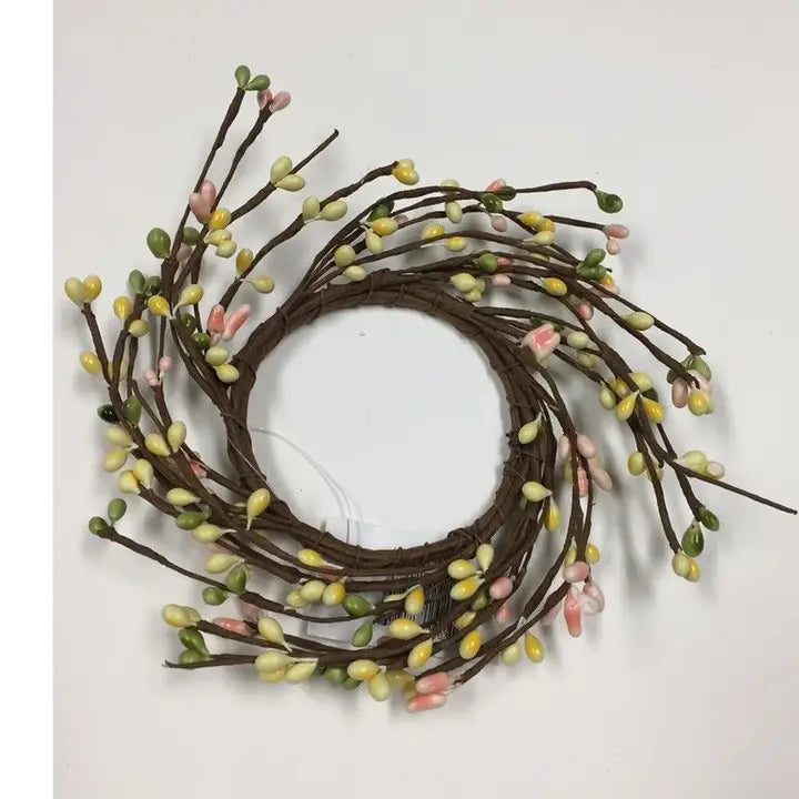 Decorative wreath with small flowers on a white background