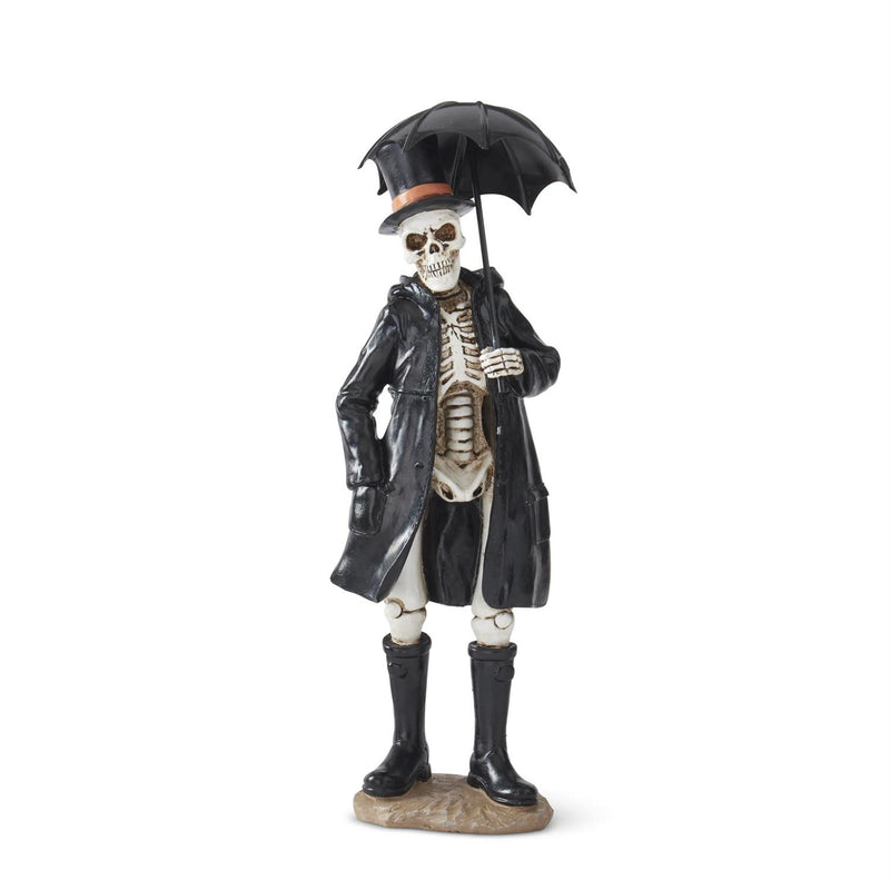 Skeleton figure in a black coat with an umbrella on a white background