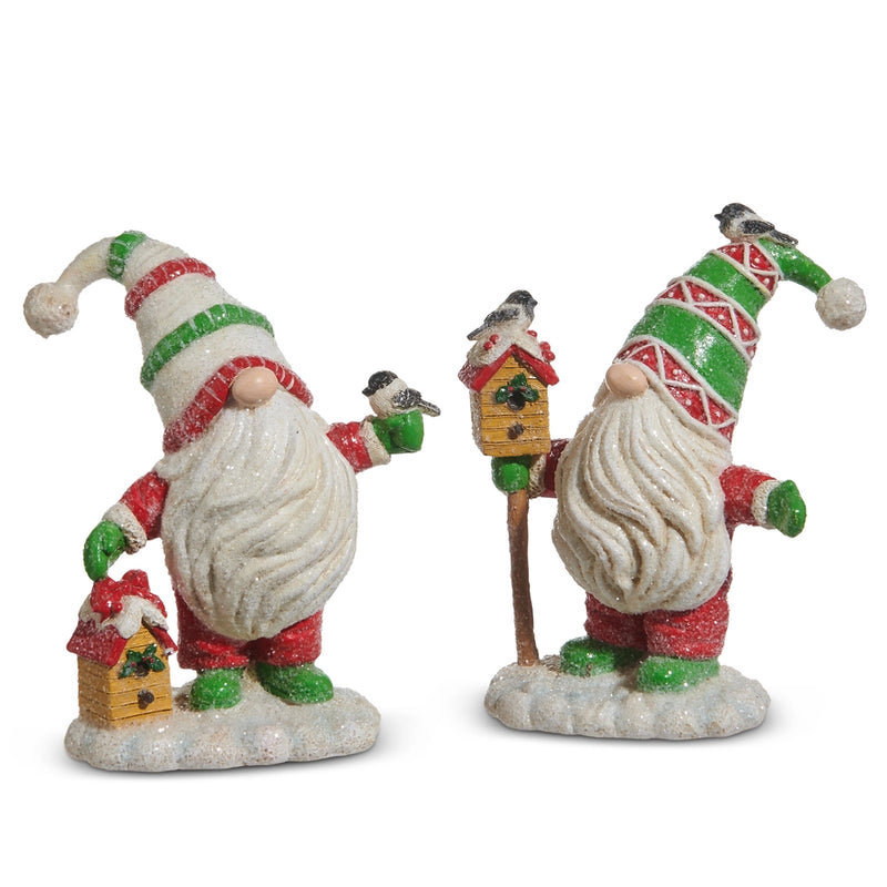 Two decorative gnomes with festive hats and birdhouses on a white background
