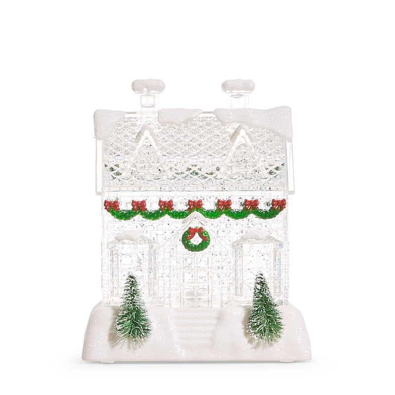 Decorative Christmas house with trees and ornaments on a white background