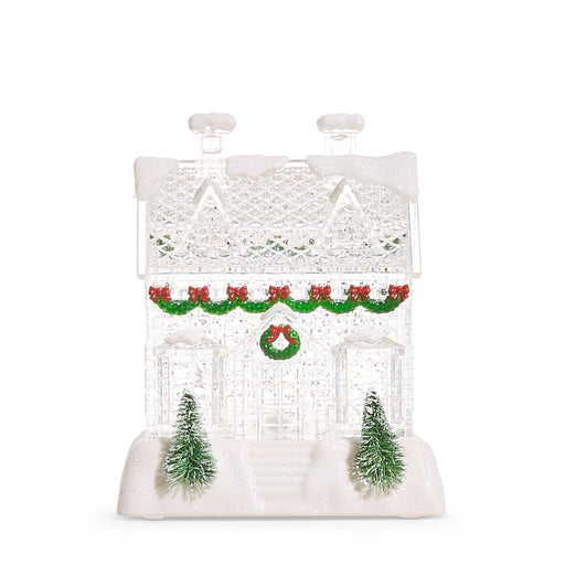 Decorative Christmas house with trees and ornaments on a white background