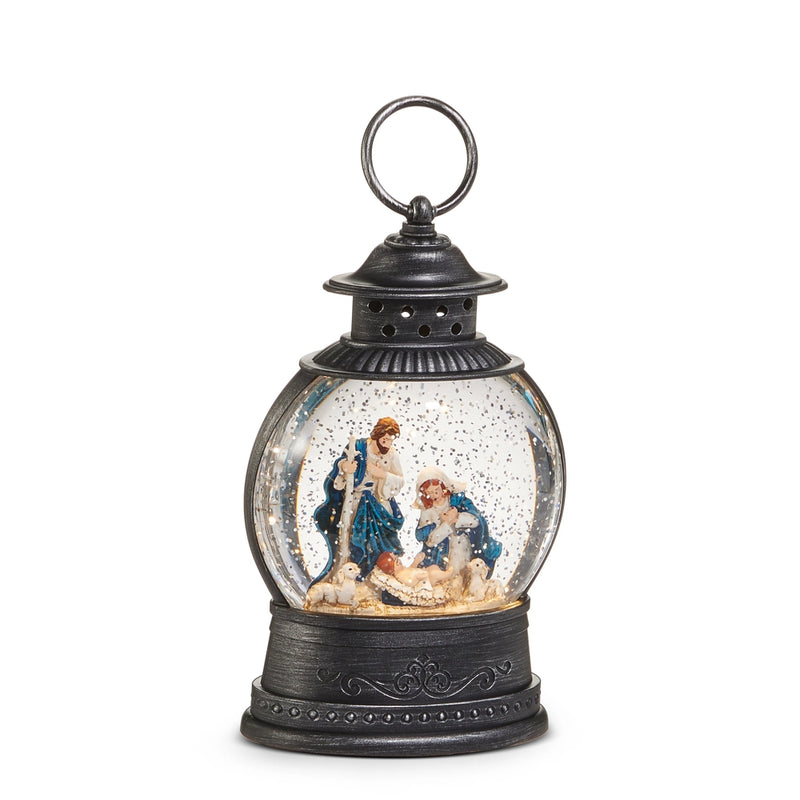 Decorative snow globe with a black lantern-style base on a white background