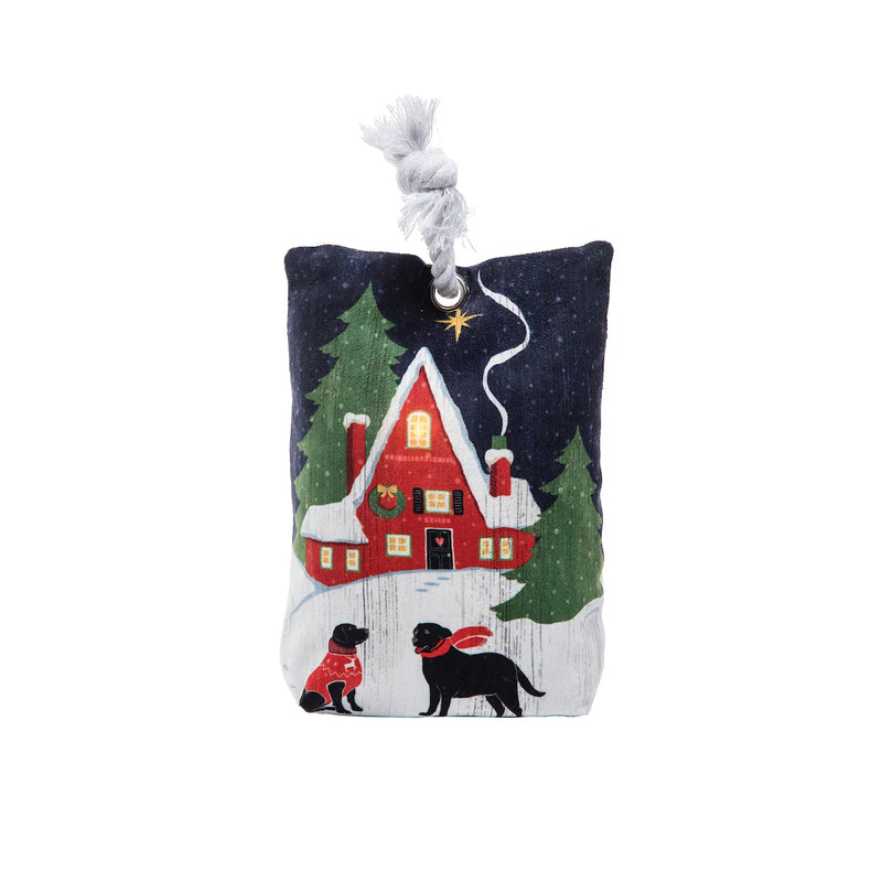 Decorative pillow with a house, trees, and dogs design on a white background
