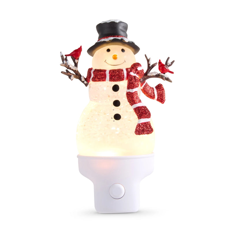 Snowman night light with a red scarf and black top hat on a white background