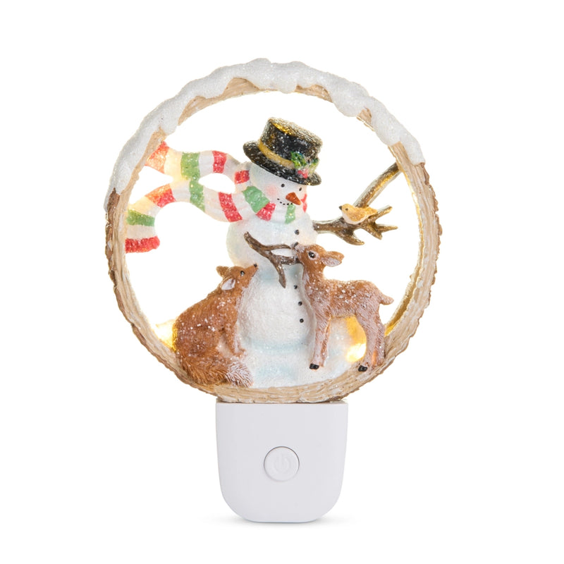 Decorative night light with a snowman, deer, and candy cane-themed design on a white background.