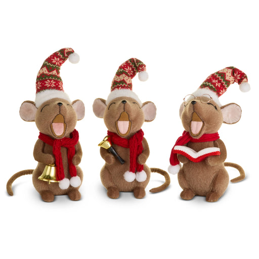 Three Christmas-themed mouse figurines with hats, scarves, and bells on a white background