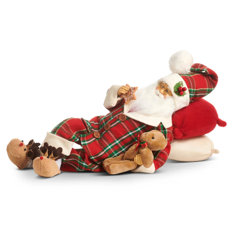 Plush toy Santa Claus with reindeer and teddy bear on a white background