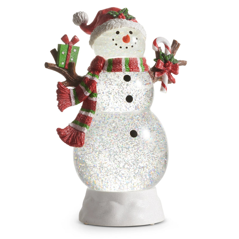 Decorative snowman figure with a red hat, scarf, and candy canes on a white background