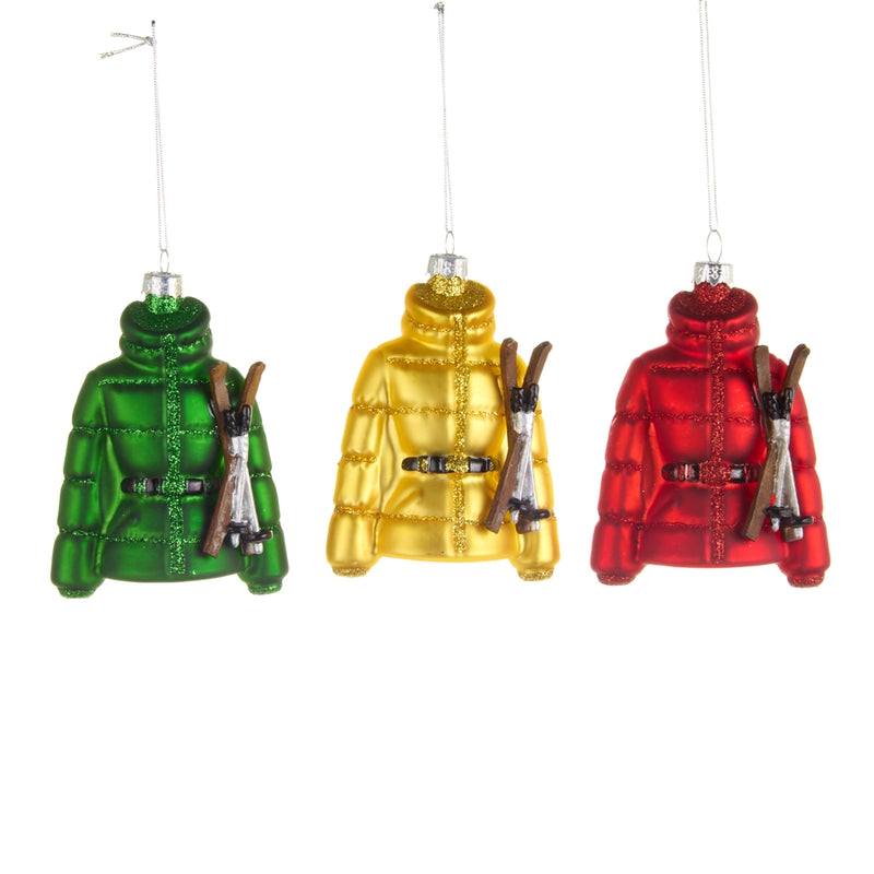 Three colorful puffer jacket ornaments in green, yellow, and red on a white background.