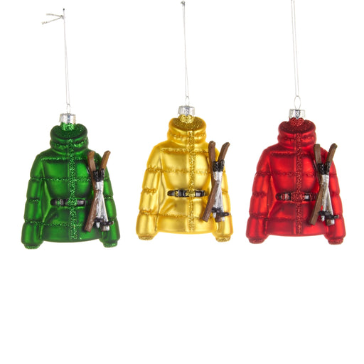 Three colorful puffer jacket ornaments in green, yellow, and red on a white background.