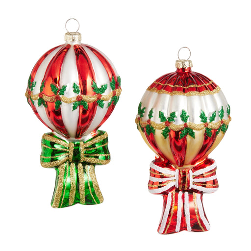 Two decorative glass hot air balloons with festive designs on a white background