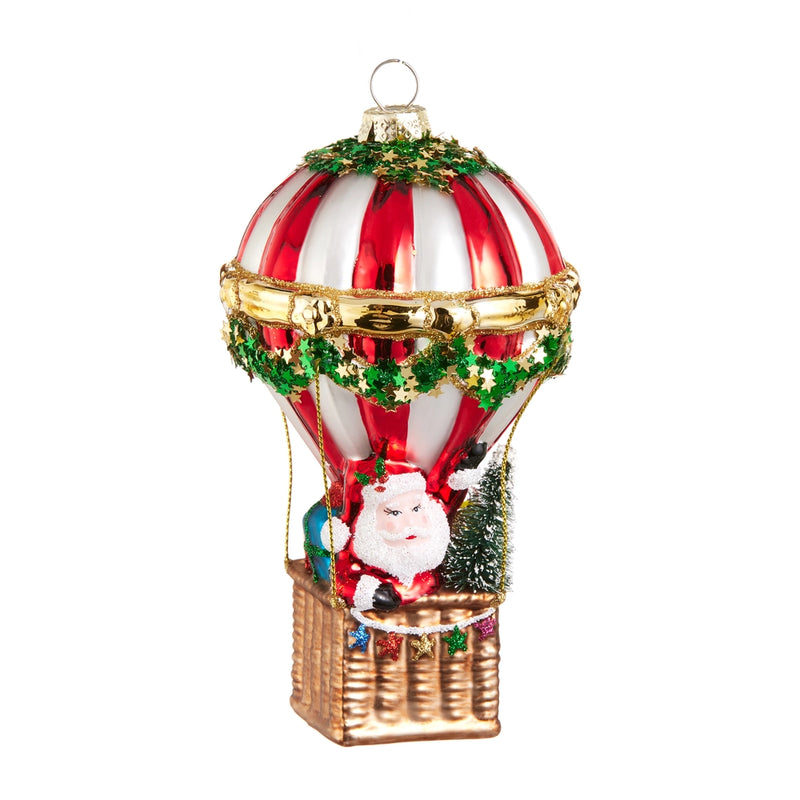 Decorative Christmas ornament of a hot air balloon with Santa Claus inside on a white background