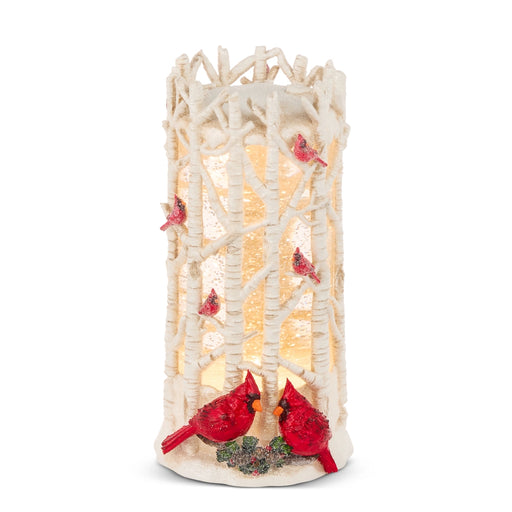Decorative lamp with red cardinals on a white background
