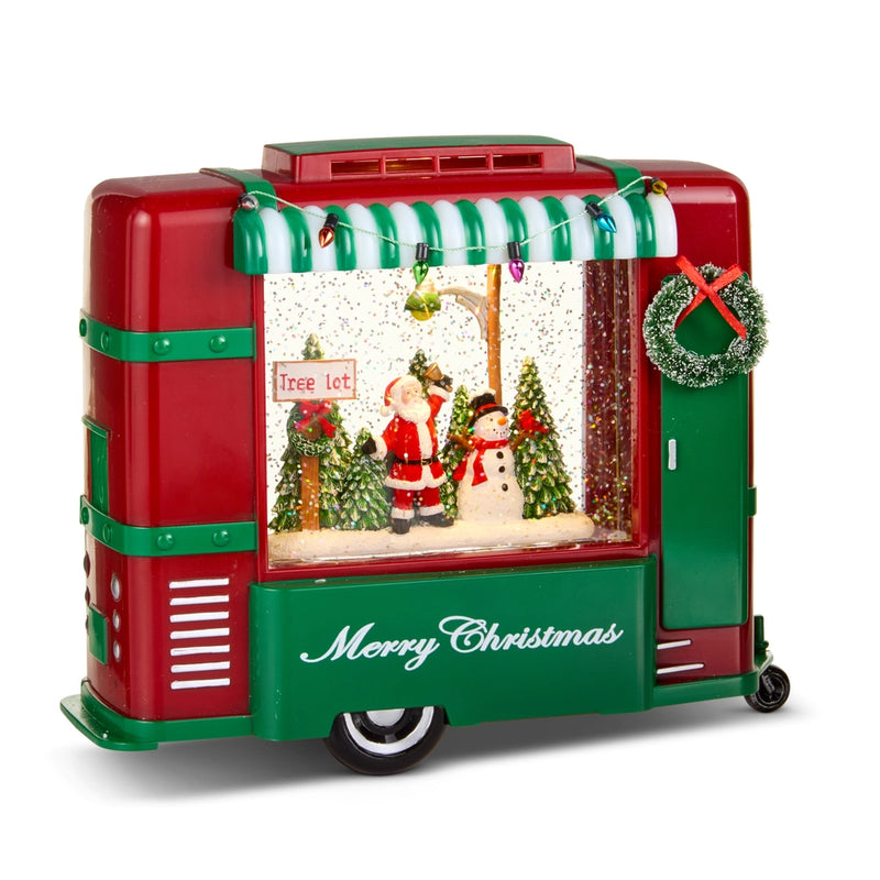 Christmas-themed candy machine with Santa Claus, snowman, and festive decorations on a white background.