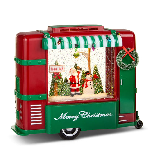 Christmas-themed candy machine with Santa Claus, snowman, and festive decorations on a white background.