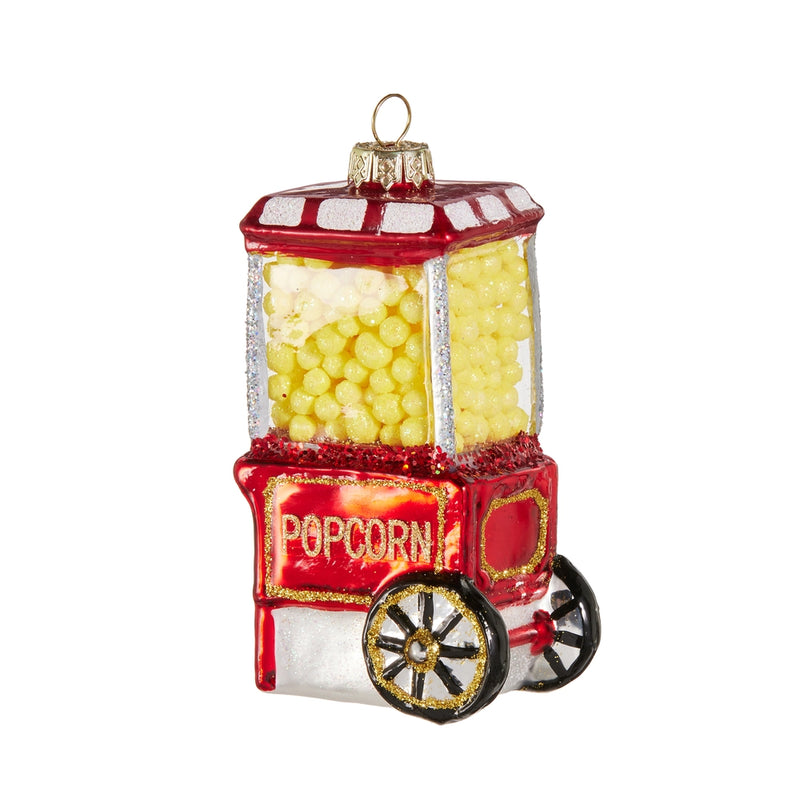 Decorative popcorn machine ornament with yellow kernels inside on a white background