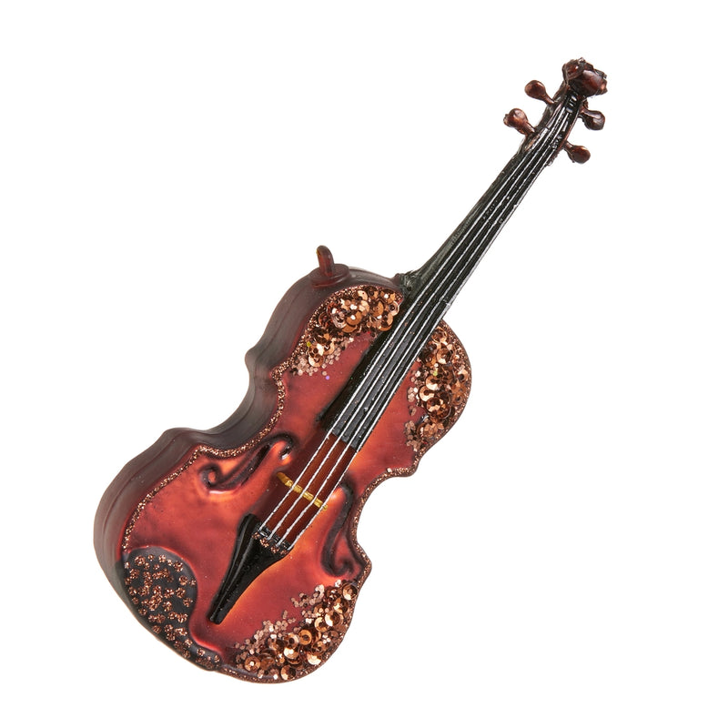 Decorative violin figurine with glittery details on a white background