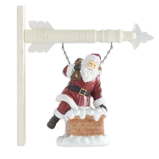 Decorative ornament of Santa Claus on a sleigh with a white background