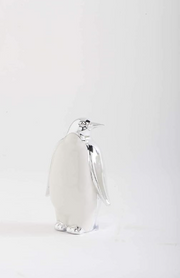 Silver penguin-shaped flask on a white background