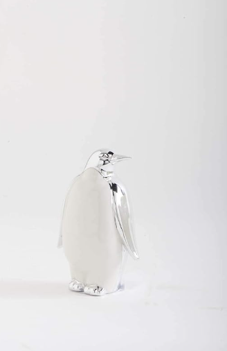 Silver penguin-shaped flask on a white background