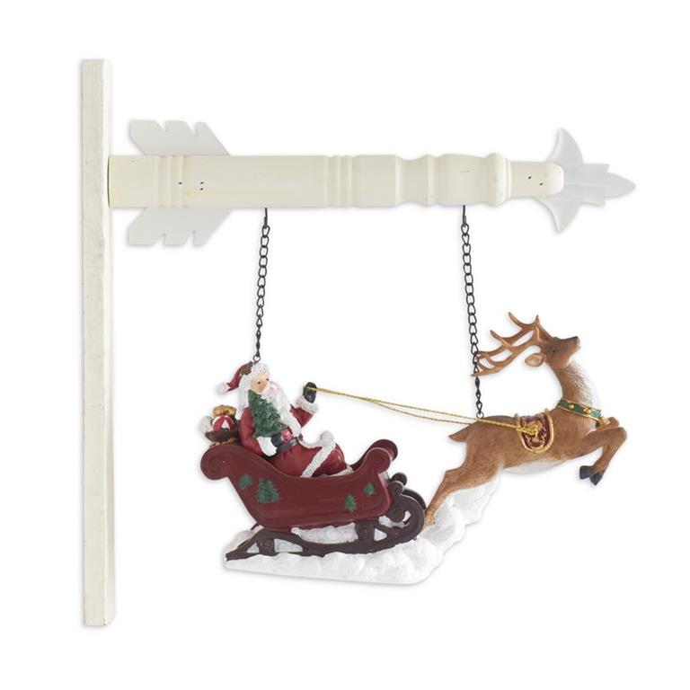 Decorative ornament of Santa in a sleigh pulled by a reindeer on a white background