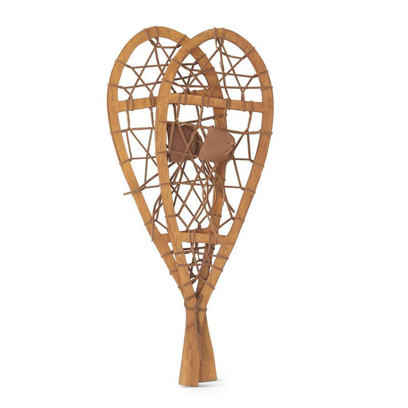 Wooden snowshoes on a white background