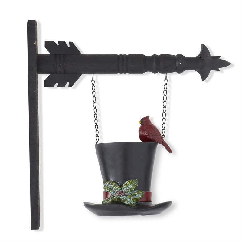 Decorative bird feeder shaped like a black top hat with a cardinal on a white background