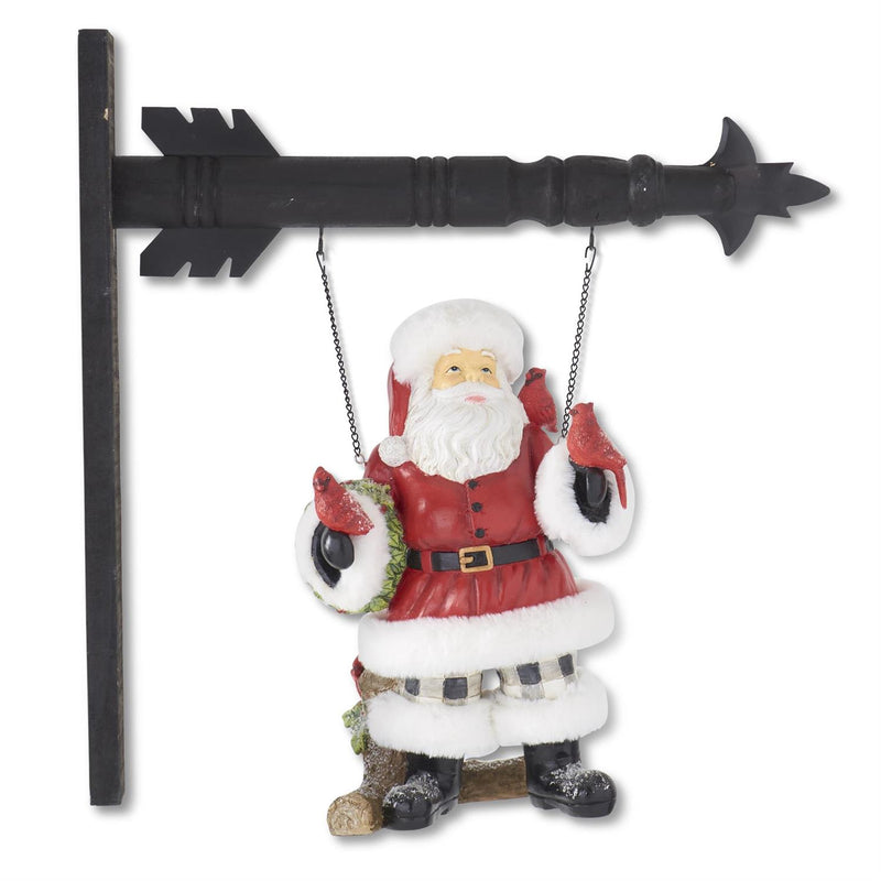 Decorative sign with Santa Claus holding birds on a white background