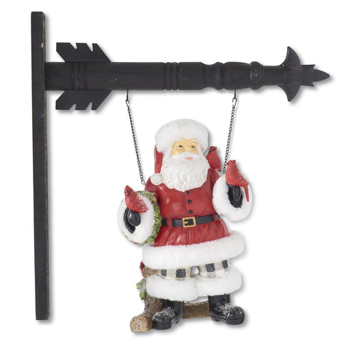 Decorative sign with Santa Claus holding birds on a white background