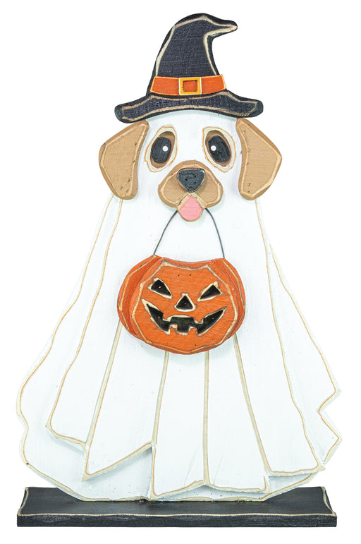 A decorative Halloween dog-shaped sign or plaque dressed as a ghost, wearing a black witch hat with an orange band and holding an orange jack-o'-lantern bucket, shown on a plain white background.