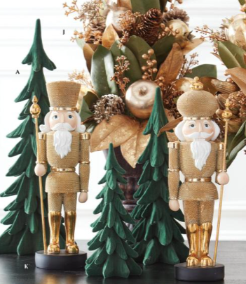 Decorative Christmas scene with nutcrackers, trees, and ornaments.