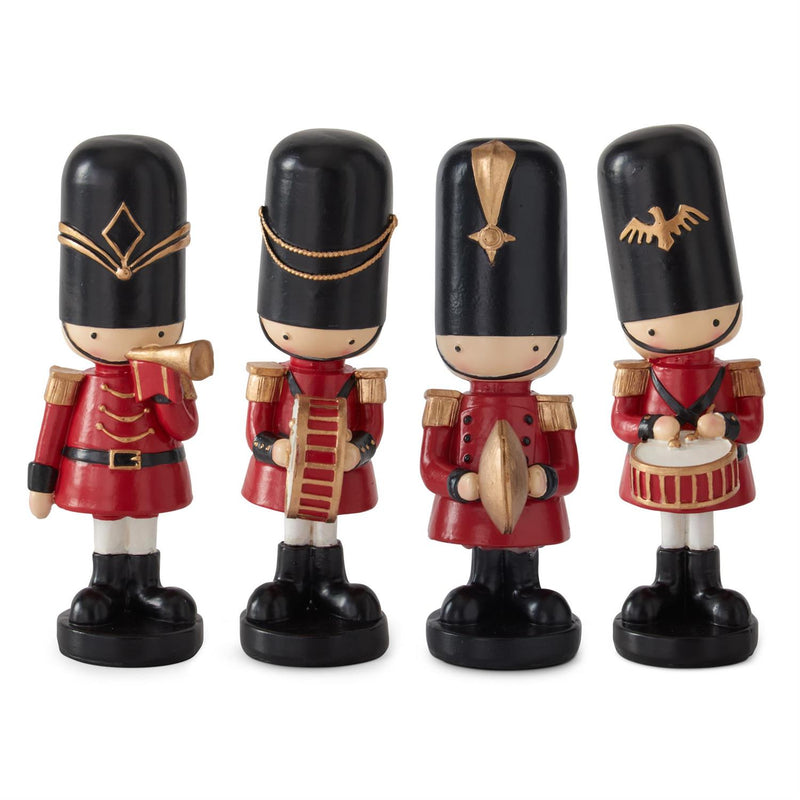Four toy soldiers in red uniforms and black hats with gold accents on a white background