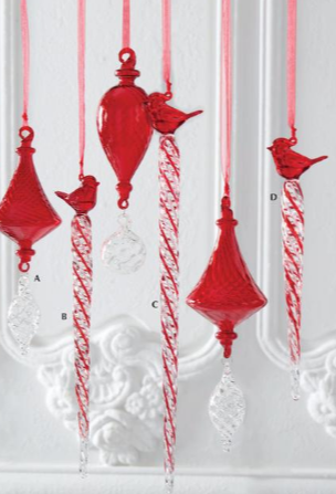 Red Christmas ornaments with candy cane designs on a white background