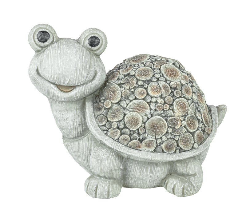 A smiling cartoon turtle figurine with a textured light gray body and a shell made of many overlapping round wood slice patterns in beige, brown, and gray tones, isolated on a white background.