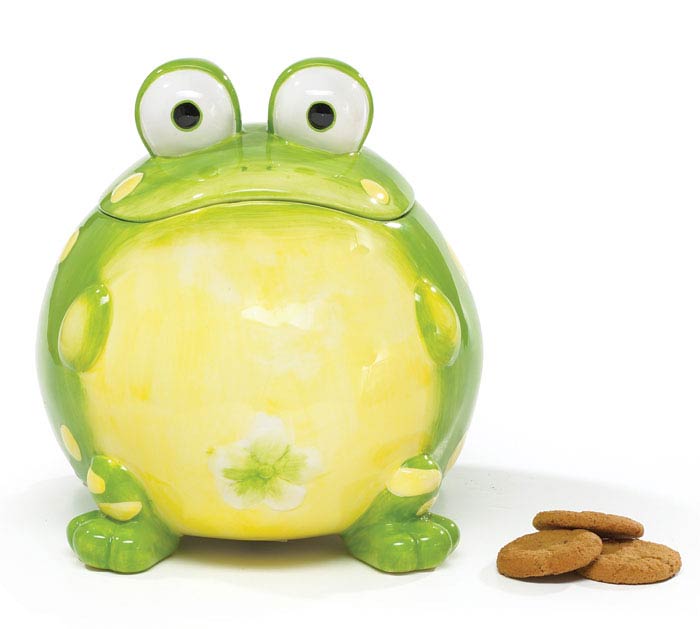 A ceramic cookie jar designed to look like a toad, with green and yellow colors, and a pair of cookies in front.