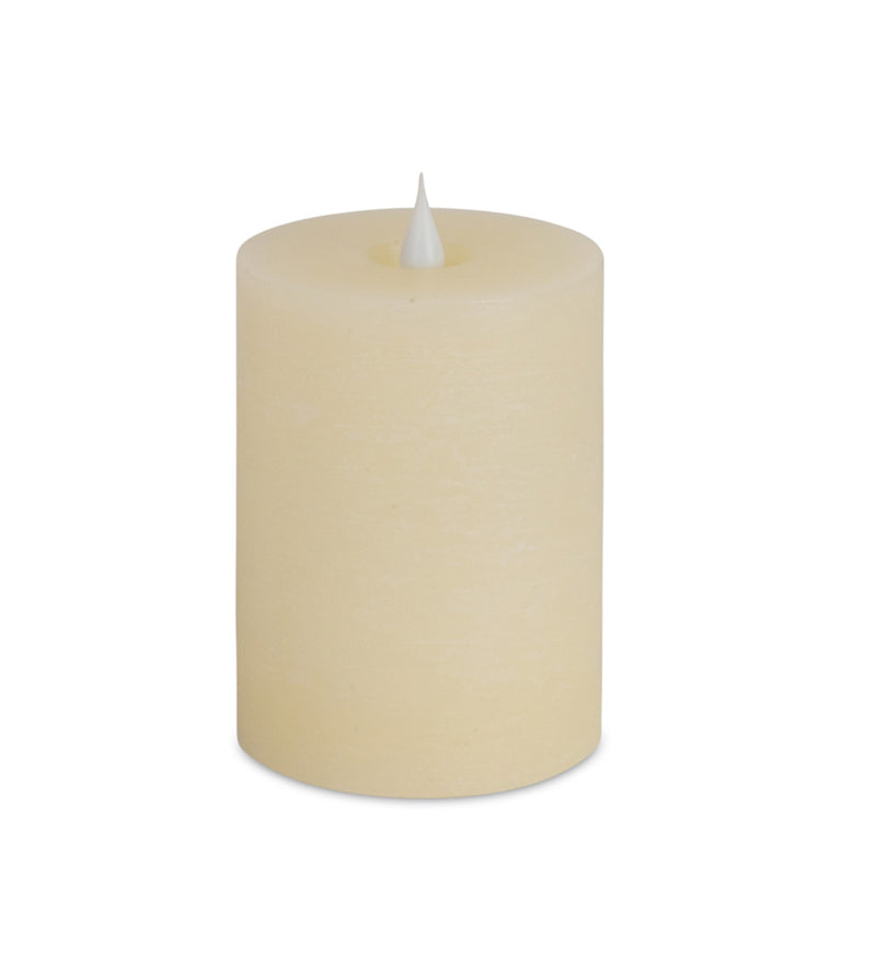 Beige candle on a white background