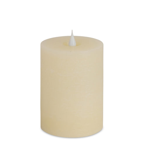 Beige candle on a white background