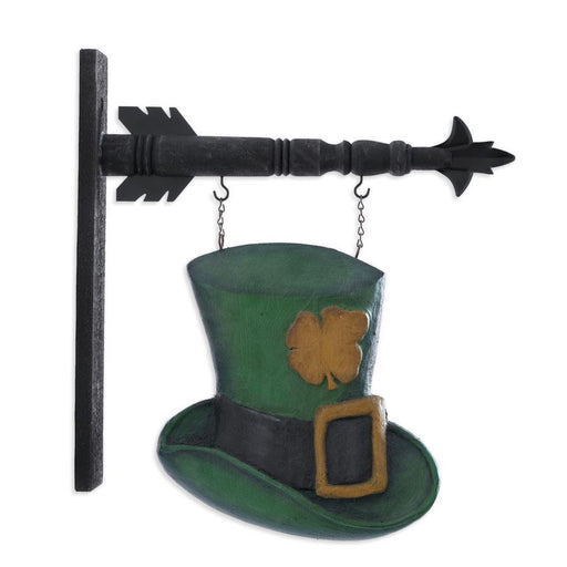 Decorative wall hook shaped like a green leprechaun hat with a brown buckle and shamrock, attached to a black arrow-shaped wall hook.