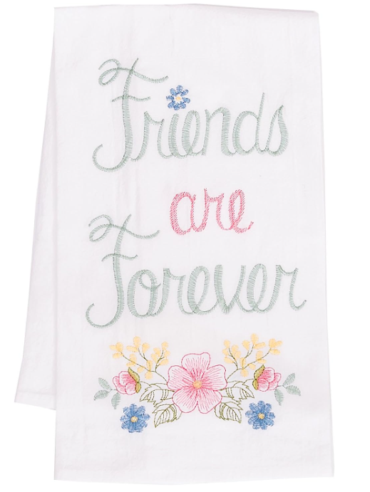 A white flour sack kitchen towel with pink and green floral embroidery and the text 'Friends are Forever'.