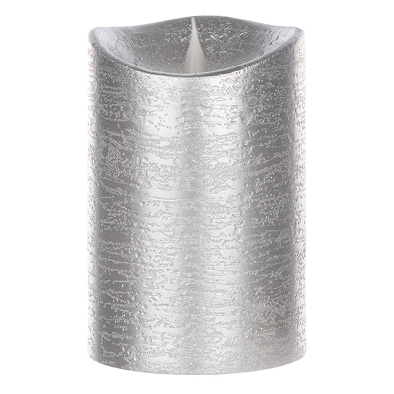 Silver textured candle on a white background