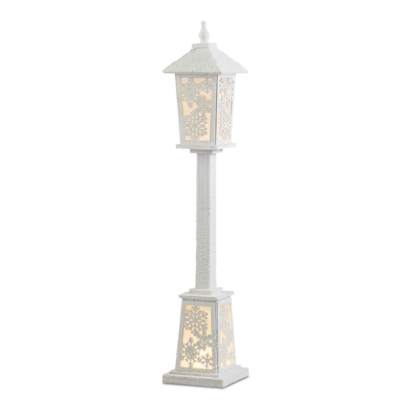 Decorative outdoor lamp with intricate design on a white background