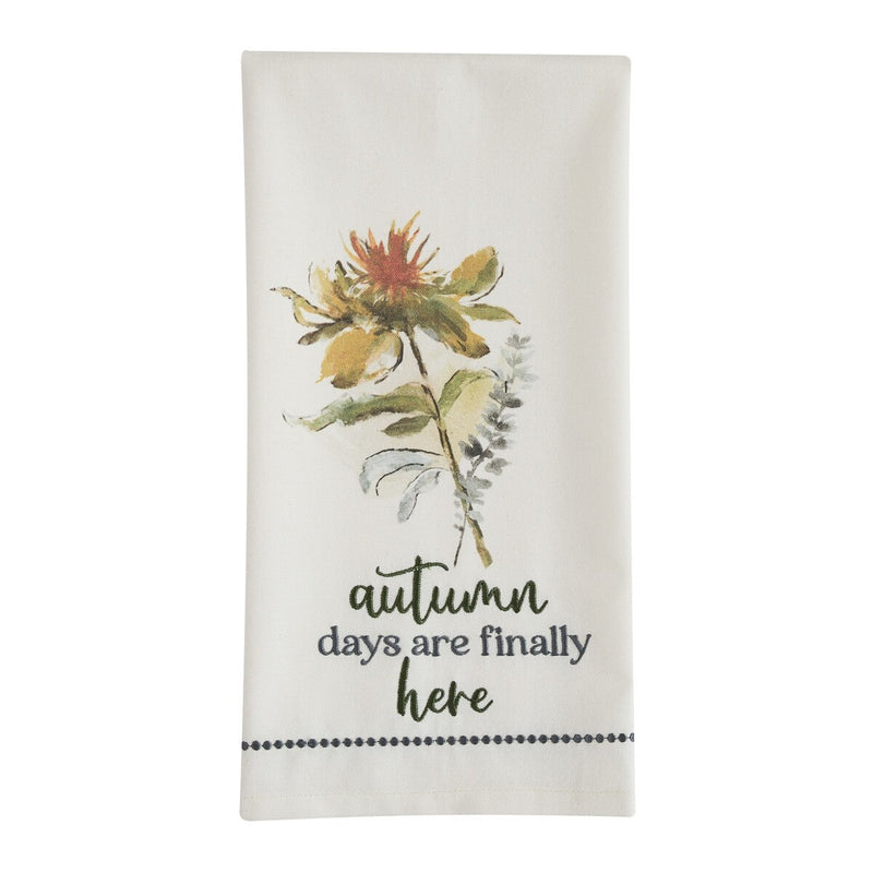 Floral design towel with 'autumn days are finally here' text on a white background