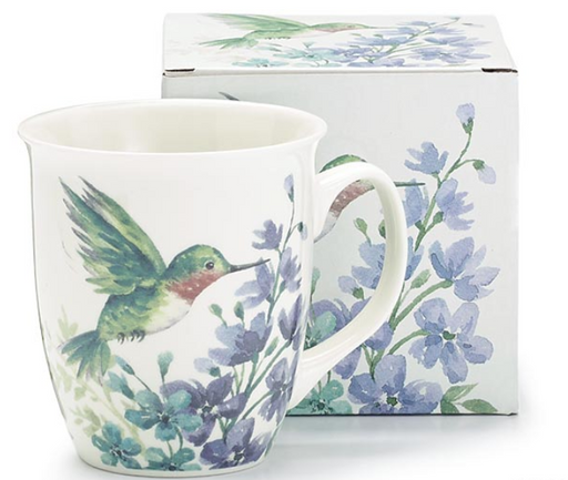 Mug with hummingbird and floral design in front of a matching box