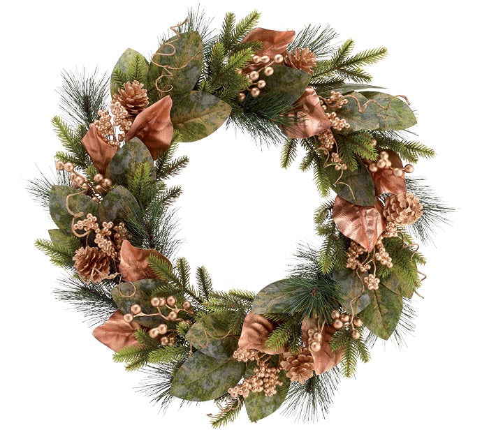 A festive holiday wreath featuring green pine needles, large green leaves, copper-colored ribbons, pinecones, and small berry clusters on a plain white background.
