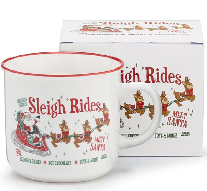 White mug with red rim and 'Sleigh Rides Meet Santa' design, next to its packaging box.