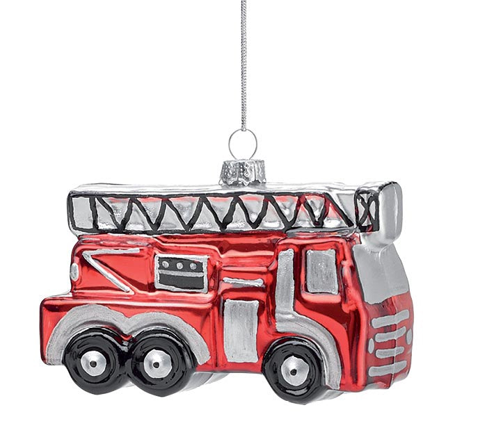 A red and silver fire truck Christmas ornament with a black ladder and wheels, hanging from a silver string against a white background.