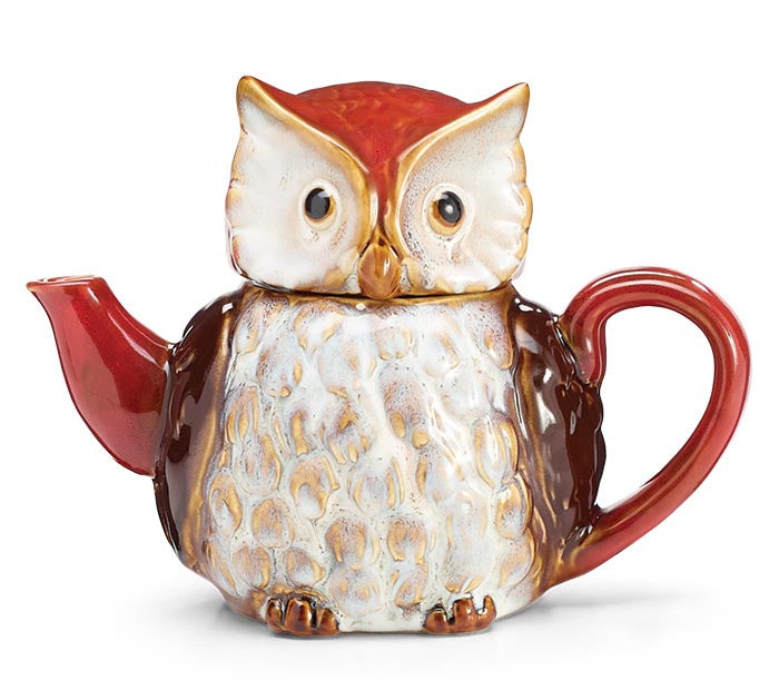 Owl-shaped teapot with red accents on a white background