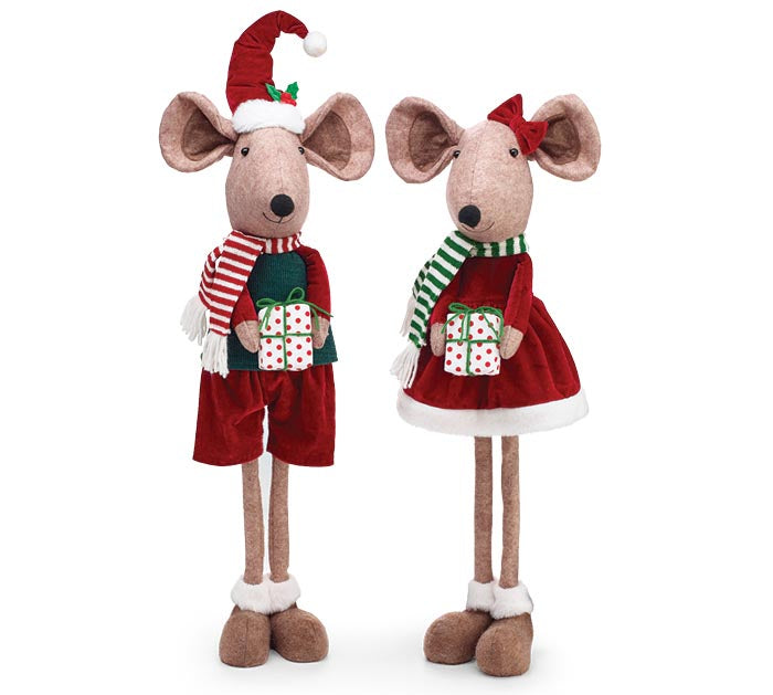 Two Christmas-themed plush mouse figurines standing side by side on a white background. One wears red shorts with a red-and-white striped scarf and green sweater, holding wrapped gifts.