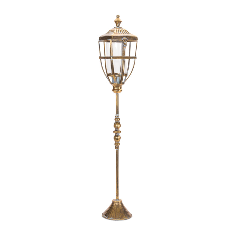 Decorative outdoor lamp post on a white background